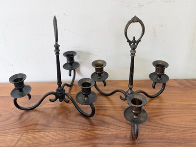 Lot 276 - Two metal candle holders