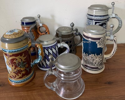 Lot 852 - A selection of beer steins various design