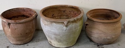 Lot 229 - Three terracotta planters various sizes...