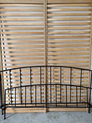 Lot 432 - A black wrought iron double bed frame.