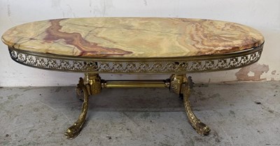 Lot 157 - An obyx marble topped coffee table on brass...