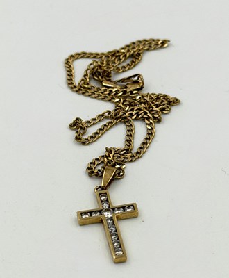 Lot 537 - A 9ct gold crucifix with necklace, approximate...
