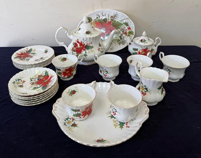Lot 325 - A part Royal Albert poinsettia pattern tea...