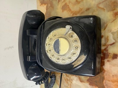 Lot 703 - A black rotary telephone