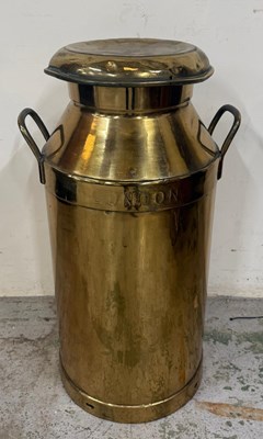 Lot 412 - A vintage brass milk churn