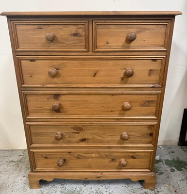 Lot 24 - A pine two over four chest of drawers. Height...
