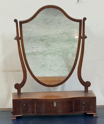 Lot 83 - A mahogany sheild toiet mirror with three...