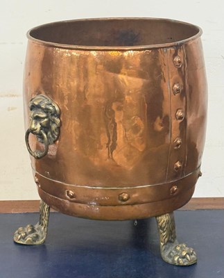 Lot 433B - A copper log bin with brass lions paw feet and...