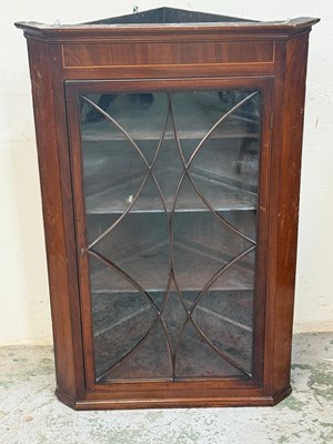 Lot 84 - A mahogany astragal glazed corner cabinet with...
