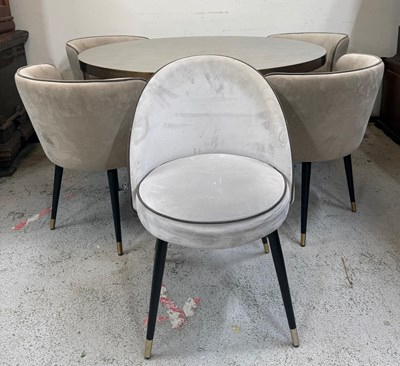 Lot 202 - A contemporary circular dining table and four...