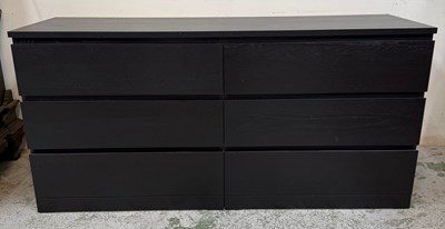 Lot 72 - A black contemporary four drawer chest of...