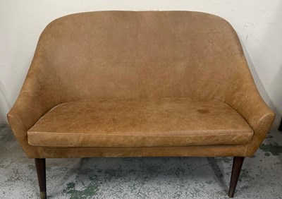 Lot 122 - A Nordic Dwell two seater brown leather sofa