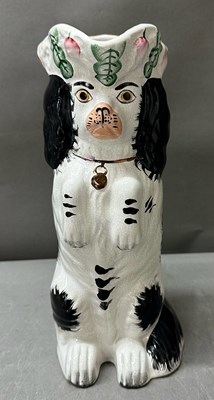 Lot 278 - A Staffordshire bedding spaniel dog jug H26cm