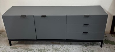Lot 17 - A modern low sideboard in grey consisiting of...