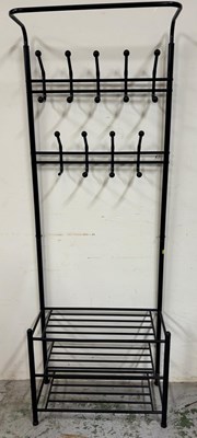 Lot 733 - A bloack framed coat and shie rack consiting...