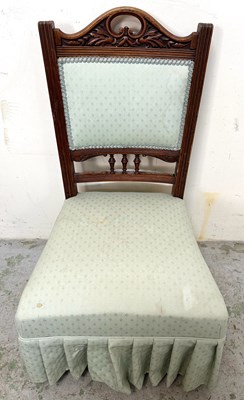 Lot 38 - A Victorian style chair featuring dark wood...