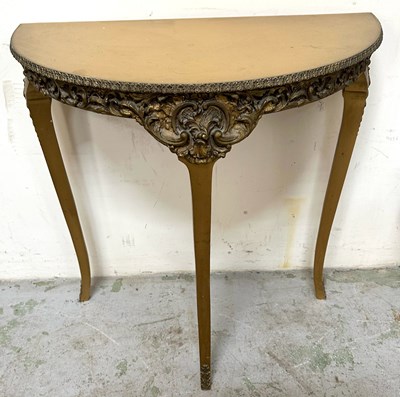 Lot 40 - A French Rococco style console table featuring...