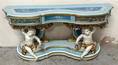 Lot 2 - A Rococco style console table with gilded...