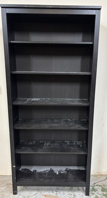 Lot 43 - Bookcase in black consiting of five adjustable...