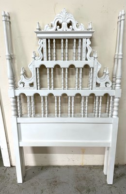 Lot 124 - A pair of Spanish revival headboard featuring...