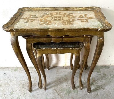 Lot 279 - An Italain nesting table set with hand painted...