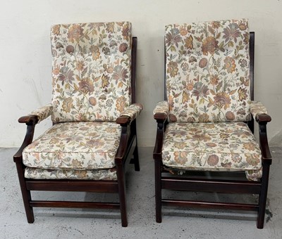 Lot 429 - A pair of vintage armchairs with dark wood frames