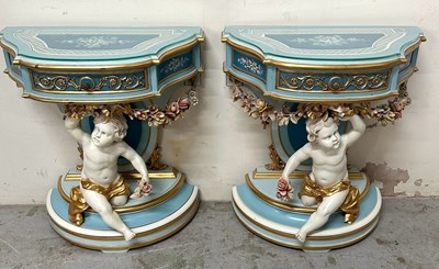 Lot 3 - A  pair of Rococco style  tables with gilded...