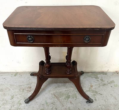 Lot 47 - A Regency style mahogany side table on four...