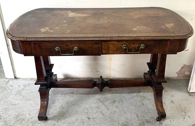 Lot 67 - A library table with two drawers under on...