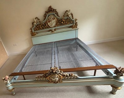 Lot 188 - An Italian style double bed frame featuring...