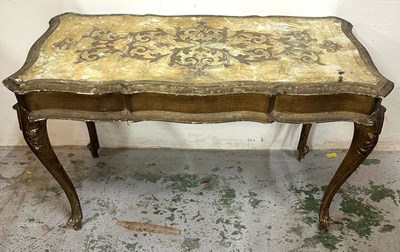 Lot 53 - An Italaind style long coffee table featuring...