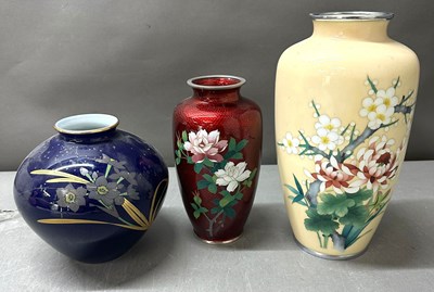 Lot 743 - A trio of Japanese vases with floral decoration