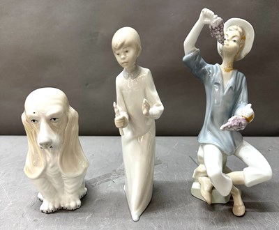 Lot 748 - Three porcelain figurnes of various styles and...