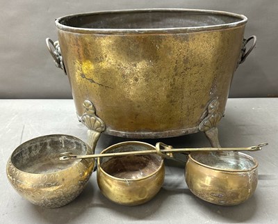 Lot 400 - A large shaped coal bucket with detailed lion...
