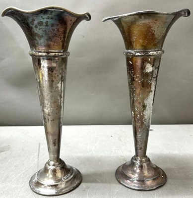 Lot 503 - A pair of silver plated trumpet candlestick...