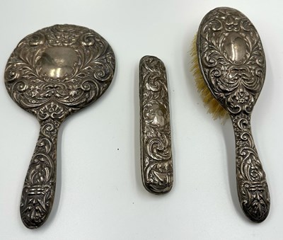 Lot 495 - An antique vanity set, with sterling silver...