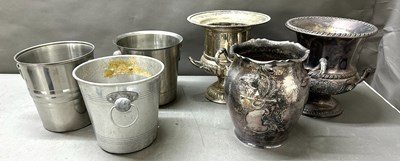 Lot 411 - A trio of champagne buckets with a varirty of...