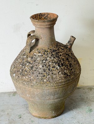 Lot 203 - A small terrocotta olive oil vessell with...