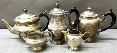 Lot 314 - A five piece tea/coffee service set with dark...