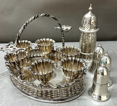 Lot 502 - An antique silver plated egg cruet set...