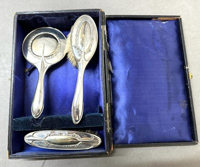 Lot 756 - A small vintage vanity set in a black case...