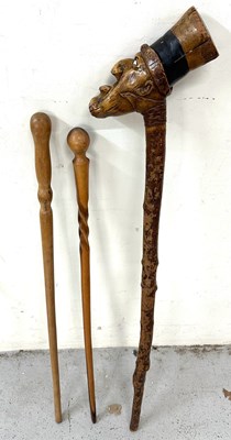 Lot 757 - A trio of vintage walking sticks one with...