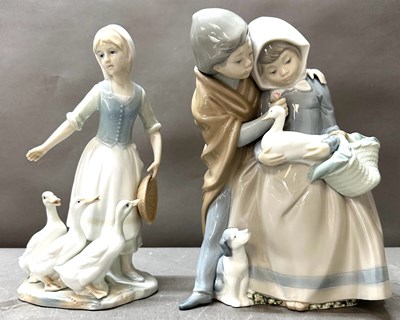 Lot 420 - Two ceramic figurines one by Nao and one St...