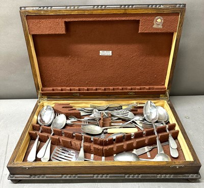 Lot 395 - A canteen of stainless cutlery housed in a...