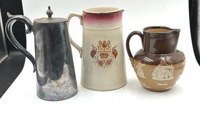 Lot 712 - A trio of jugs to include a Royal Doulton...