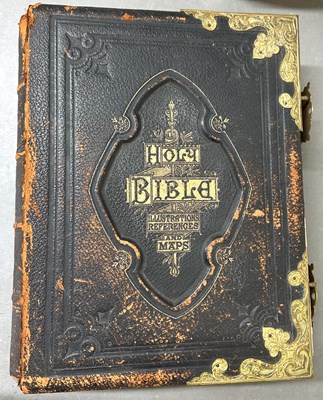Lot 619 - A 19th Century Holy bible with a leather...