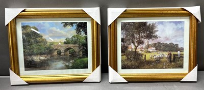 Lot 767 - Two framed prints depicting countryside scenes...