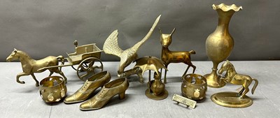 Lot 402 - A selection of brass to include horses, an...