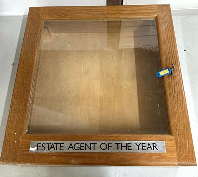 Lot 61 - A wooden display box with glass front and lock...