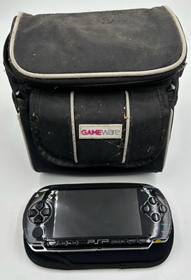 Lot 846 - A hand held Play Stationportable with a...